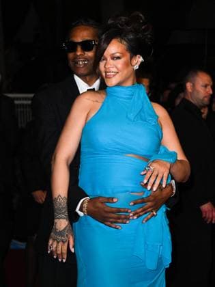 Cannes, 78th Cannes Film Festival 2025 - evening 7 - Asap and Rihanna Under Umbrella Cannes, 78th Cannes Film Festival 2025 - evening 7 - Red Carpet of the film Highest 2 Lowest . In the photo Asap Rocky (A Rocky) and Rihanna Cannes France  Copyright: xIPA ABACAx