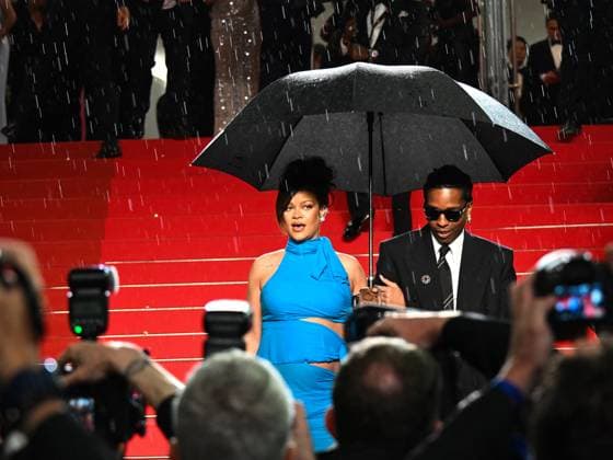 Cannes, 78th Cannes Film Festival 2025 - evening 7 - Asap and Rihanna Under Umbrella Cannes, 78th Cannes Film Festival 2025 - evening 7 - Red Carpet of the film Highest 2 Lowest . In the photo Asap Rocky (A Rocky) and Rihanna Cannes France  Copyright: xIPA ABACAx