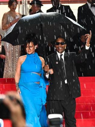 Cannes, 78th Cannes Film Festival 2025 - night 7 - Asap and Rihanna Under Umbrella Cannes, 78th Cannes Film Festival 2025 - evening 7 - Red Carpet of the film Highest 2 Lowest . In the photo Asap Rocky (A Rocky) and Rihanna Cannes France  Copyright: xIPA ABACAx