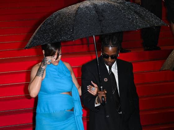 Cannes, 78th Cannes Film Festival 2025 - night 7 - Asap and Rihanna Under Umbrella Cannes, 78th Cannes Film Festival 2025 - evening 7 - Red Carpet of the film Highest 2 Lowest . In the photo Asap Rocky (A Rocky) and Rihanna Cannes France  Copyright: xIPA ABACAx