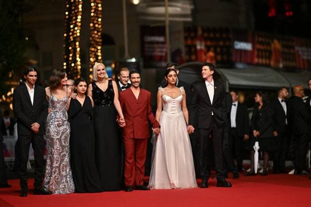 Cannes Alpha Screening JR Louai El Amrousy, Emma Mackey, Mélissa Boros, Julia Ducournau, Arnaud Chautard, Tahar Rahim, Jean-Rachid Kallouche, Golshifteh Farahani, Nicolas Altmayer, Finnegan Oldfield and Éric Altmayer attending the screening of Alpha at 78th Cannes Film Festival in Cannes, France on May, 19, 2025. Photo by Julien Reynaud APS-Medias ABACAPRESS.COM Cannes France  Copyright: xReynaudxJulien APS-Medias ABACAx