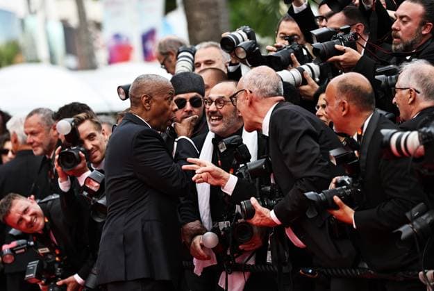 (250520) -- CANNES, May 20, 2025 -- U.S. actor Denzel Washington (L, front) arrives for the screening of the film Highest 2 Lowest at the 78th edition of the Cannes Film Festival in Cannes, southern France, on May 19, 2025. ) FRANCE-CANNES-FILM FESTIVAL-HIGHEST 2 LOWEST-SCREENING GaoxJing 