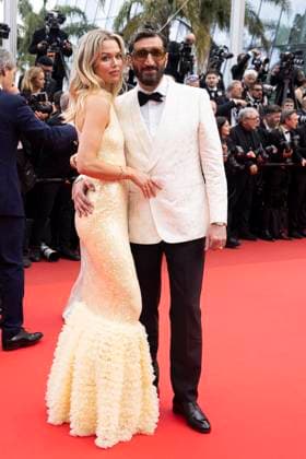 Eagles Of The Republic Clara Hallencreutz and Fares Fares depart the Eagles Of The Republic (Les Aigles De La RÃ publique) red carpet at the 78th annual Cannes Film Festival at Palais des Festivals on May 19, 2025 in Cannes, France.  Copyright: x Chassery+Courdjix