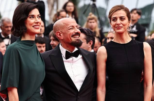 (250520) -- CANNES, May 20, 2025 -- Swedish director Tarik Saleh (C) leaves with cast members after the screening of the film Eagles of the Republic at the 78th edition of the Cannes Film Festival in Cannes, southern France, on May 19, 2025. ) FRANCE-CANNES-FILM FESTIVAL-EAGLES OF THE REPUBLIC-SCREENING GaoxJing 