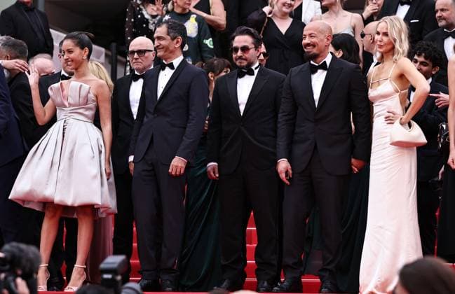 (250520) -- CANNES, May 20, 2025 -- Swedish director Tarik Saleh (2nd R, front) leaves with cast members after the screening of the film Eagles of the Republic at the 78th edition of the Cannes Film Festival in Cannes, southern France, on May 19, 2025. ) FRANCE-CANNES-FILM FESTIVAL-EAGLES OF THE REPUBLIC-SCREENING GaoxJing 