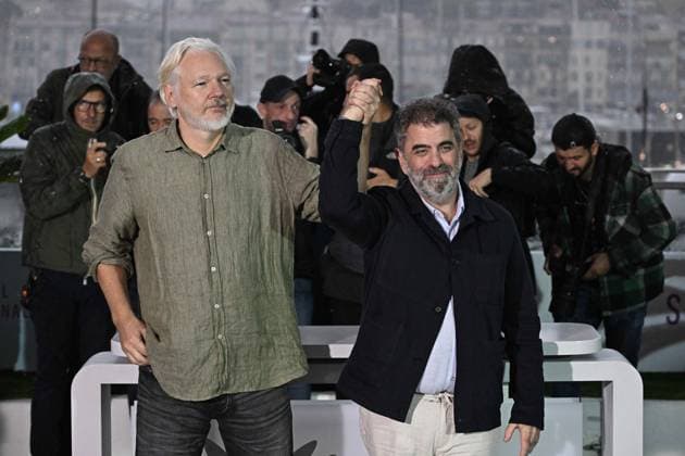 RECORD DATE NOT STATED Cannes - The Six Billion Dollar Man Photocall Julian Assange and Eugene Jarecki pose during the The Six Billion Dollar Man photocall at the 78th annual Cannes Film Festival at Palais des Festivals on May 20, 2025 in Cannes, France. Photo by David Niviere ABACAPRESS.COM Cannes France  Copyright: xNivierexDavid ABACAPRESS.COMx