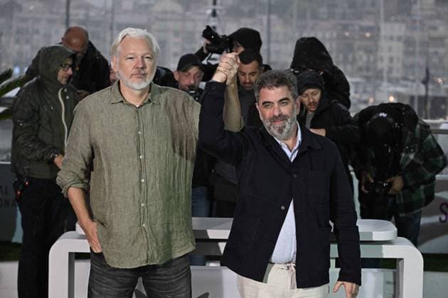 RECORD DATE NOT STATED Cannes - The Six Billion Dollar Man Photocall Julian Assange and Eugene Jarecki pose during the The Six Billion Dollar Man photocall at the 78th annual Cannes Film Festival at Palais des Festivals on May 20, 2025 in Cannes, France. Photo by David Niviere ABACAPRESS.COM Cannes France  Copyright: xNivierexDavid ABACAPRESS.COMx