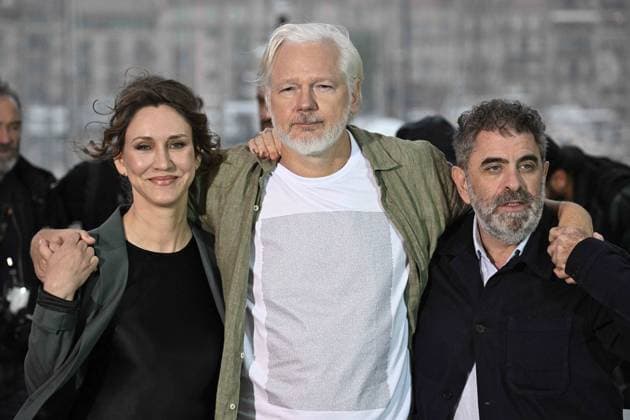 RECORD DATE NOT STATED Cannes - The Six Billion Dollar Man Photocall Kathleen Fournier, Julian Assange and Eugene Jarecki pose during the The Six Billion Dollar Man photocall at the 78th annual Cannes Film Festival at Palais des Festivals on May 20, 2025 in Cannes, France. Photo by David Niviere ABACAPRESS.COM Cannes France  Copyright: xNivierexDavid ABACAPRESS.COMx