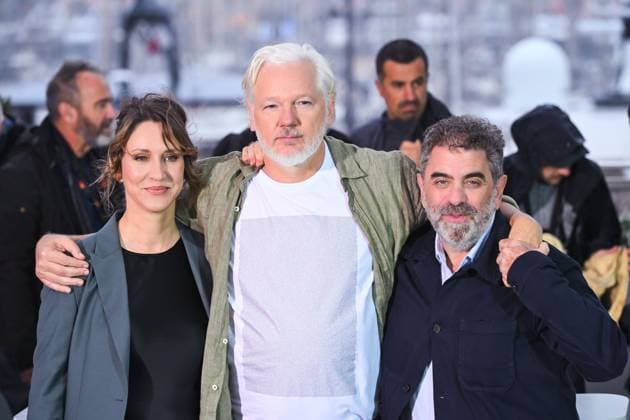 Cannes, Italy: Cannes, 78th Cannes Film Festival 2025 - day 7 - photocall of the film The Six Billion Dollar Man In the photo: Kathleen Fournier, Julian Assange , Eugene Jarecki Cannes Italy  - ZUMAp169 20250520_zea_p169_170 Copyright: xAlbertoxTerenghix