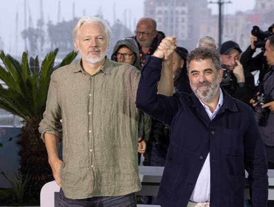 The Six Billion Dollar Man photocall at the 78th annual Cannes Film Festival Julian Assange and Eugene Jarecki pose during the The Six Billion Dollar Man photocall at the 78th annual Cannes Film Festival at Palais des Festivals on May 20, 2025 in Cannes, France.  Copyright: x Chassery+Courdjix