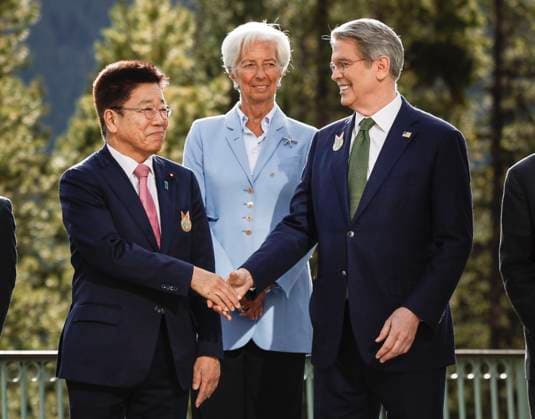 May 21, 2025, Banff, Ab, CANADA: United States secretary of the treasury Scott Bessent, right, shakes hands with Japan s Finance Minister Katsunobu Kato, left, as European Central Bank head Christine Lagarde, look on at the G7 Finance Ministers meeting in Banff, Alta., Wednesday, May 21, 2025. Banff CANADA - ZUMAc35_ 20250521_zaf_c35_022 Copyright: xJeffxMcintoshx