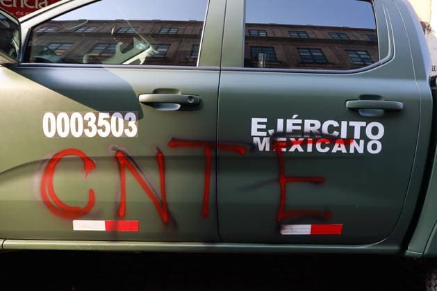 Teachers Block National Palace To Demand Repeal of the 2007 ISSSTE Law A Mexican Navy vehicle is seen graffitied with the initials CNTE during a protest of teachers from the National Coordination of Education Workers (CNTE) demanding the immediate repeal of the 2007 ISSSTE Law and a 100% base salary increase. on May 21, 2025 in Mexico City, Mexico. (Photo by Carlos Santiago Eyepix Group) Copyright: xCarlosxSantiago xEyepixxGroupx CS_21052025_156019