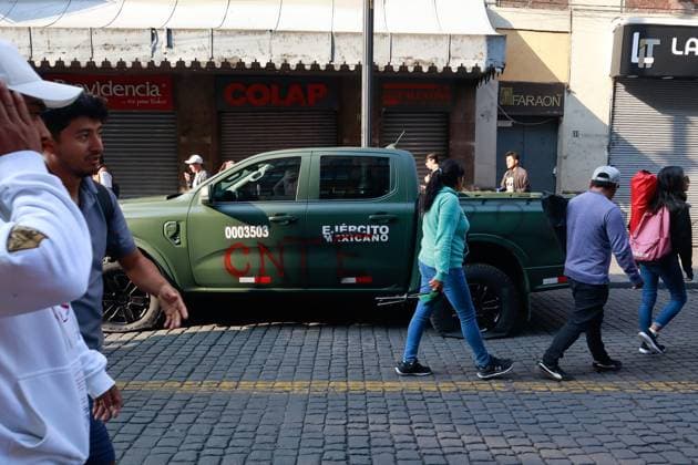 A Mexican Navy vehicle is seen graffitied with the initials CNTE during a protest of teachers from the National Coordination of Education Workers (CNTE) demanding the immediate repeal of the 2007 ISSSTE Law and a 100% base salary increase. on May 21, 2025 in Mexico City, Mexico. Mexico City Mexico - ZUMAe321 20250521_zia_e321_009 Copyright: xCarlosxSantiagox