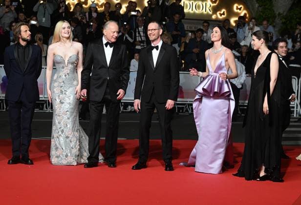 American actress Elle Fanning , Swedish actor Stellan Skarsgard, Norwegian director Joachim Trier, actor Anders Danielsen Lie, actresses Inga Ibsdotter Lilleaas and Renate Reinsve attend the premiere of Sentimental Value at the 78th Cannes Film Festival in Cannes, France on Wednesday May 21, 2025.  CAN20250521140 RUNExHELLESTAD