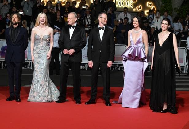 American actress Elle Fanning , Swedish actor Stellan Skarsgard, Norwegian director Joachim Trier, actor Anders Danielsen Lie, actresses Inga Ibsdotter Lilleaas and Renate Reinsve attend the premiere of Sentimental Value at the 78th Cannes Film Festival in Cannes, France on Wednesday May 21, 2025.  CAN20250521142 RUNExHELLESTAD