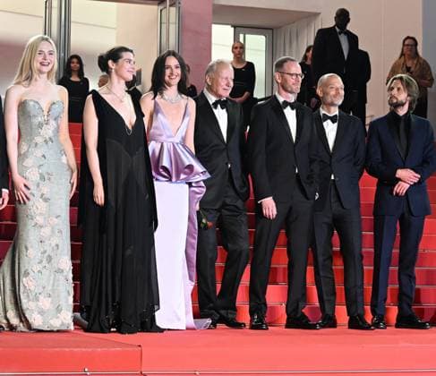 American actress Elle Fanning , Swedish actor Stellan Skarsgard, Norwegian producer Nils Vogt, director Joachim Trier, actor Anders Danielsen Lie, actresses Inga Ibsdotter Lilleaas and Renate Reinsve attend the premiere of Sentimental Value at the 78th Cannes Film Festival in Cannes, France on Wednesday May 21, 2025.  CAN20250521144 RUNExHELLESTAD