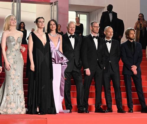 American actress Elle Fanning , Swedish actor Stellan Skarsgard, Norwegian producer Nils Vogt, director Joachim Trier, actor Anders Danielsen Lie, actresses Inga Ibsdotter Lilleaas and Renate Reinsve attend the premiere of Sentimental Value at the 78th Cannes Film Festival in Cannes, France on Wednesday May 21, 2025.  CAN20250521145 RUNExHELLESTAD