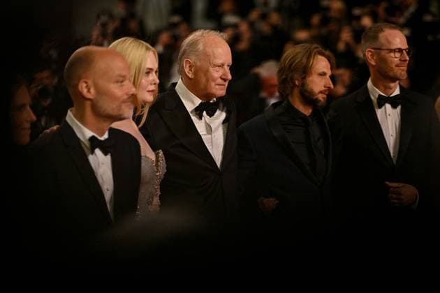 Cannes Sentimental Value Screening JR Elle Fanning, Stellan Skarsgard attending the screening of Sentimental Value at 78th Cannes Film Festival in Cannes, France on May, 21, 2025. Photo by Julien Reynaud APS-Medias ABACAPRESS.COM Cannes France  Copyright: xReynaudxJulien APS-Medias ABACAx