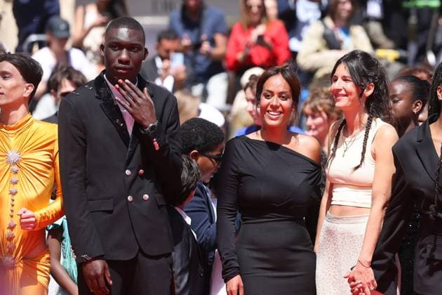 J Montée des marches du film Man O Bachech Woman and child lors du 78ème Festival International du Film de Cannes Yuming Hey, Mouctar Diawara, Amel Bent, Lise Akoka Montée des marches du film Man O Bachech Woman and child lors du 78ème Festival International du Film de Cannes, au Palais des Festivals à Cannes Le 22 mai 2025 Jacovides Moreau Bestimage Red carpet for the movie Man O Bachech Woman and child during the 78th Cannes International Film Festival at the Palais des Festivals in Cannes, France On may 21th 2025 Cannes France  Copyright: xJACOVIDES-MOREAUx xBESTIMAGExJACOVIDES-MOREAUx xBESTIMAGEx