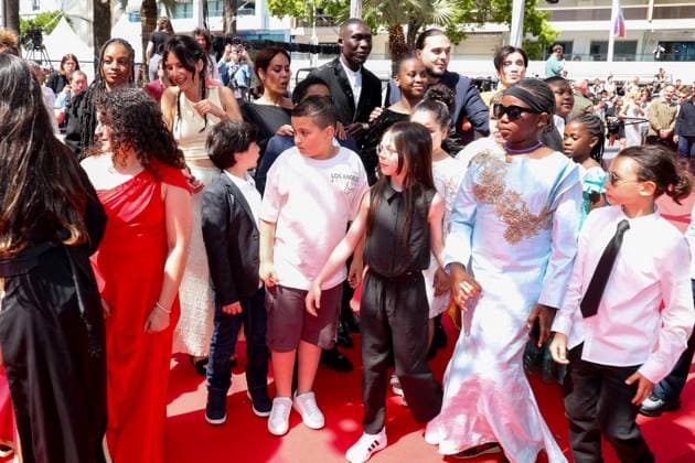 J Montée des marches du film Man O Bachech Woman and child lors du 78ème Festival International du Film de Cannes Fanta Kebe, Lise Akoka, Amel Bent, Mouctar Diawara, Zakaria Tayeb Lazab, Yuming Hey, guest Montée des marches du film Man O Bachech Woman and child lors du 78ème Festival International du Film de Cannes, au Palais des Festivals à Cannes Le 22 mai 2025 Jacovides Moreau Bestimage Red carpet for the movie Man O Bachech Woman and child during the 78th Cannes International Film Festival at the Palais des Festivals in Cannes, France On may 21th 2025 Cannes France  Copyright: xJACOVIDES-MOREAUx xBESTIMAGExJACOVIDES-MOREAUx xBESTIMAGEx