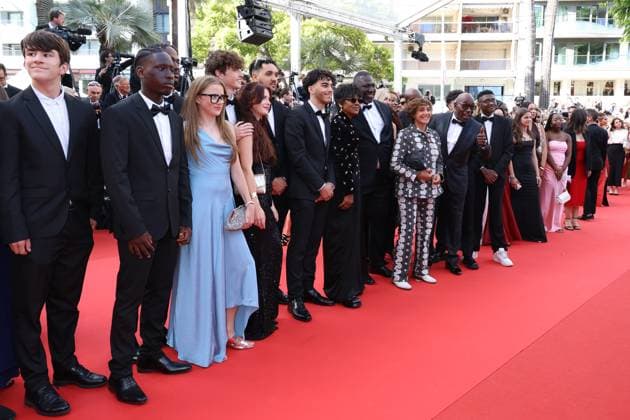 78eme Festival International du Film de Cannes Montée des marches du film La venue de lavenir 78th Cannes Film Festival Red carpet of the film La venue de lavenir Lucien Jean Baptiste and the winners of the Moteur project 444965 2025 05 22 Cannes France  Copyright: xIsabellexVautierx xStarfacex STAR_444965_004