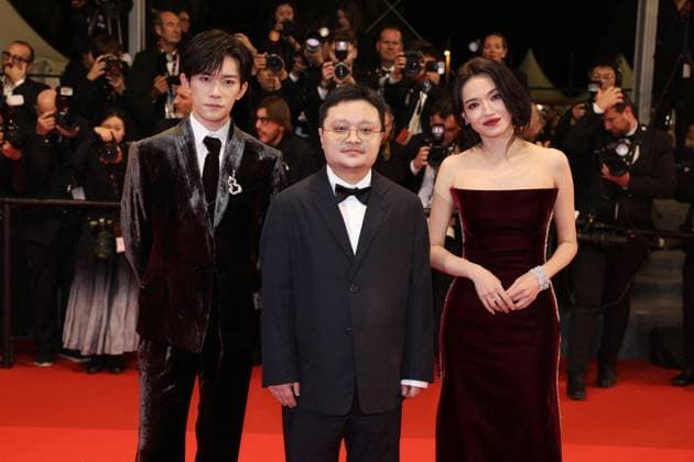 Internationale Filmfestspiele von Cannes, Kuang Ye Shi Dai - Resurrection Premiere Cannes - Resurrection Screening JD Jackson Yee, Gan Bi and Shu Qi attend the red carpet and screening of Resurrection in Cannes, France, on May 22, 2025, as part of the Cannes Film Festival. Photo by Jerome Domine ABACAPRESS.COM Cannes France  Copyright: xDominexJerome ABACAx