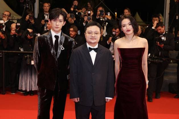 Internationale Filmfestspiele von Cannes, Kuang Ye Shi Dai - Resurrection Premiere Cannes - Resurrection Screening JD Jackson Yee, Gan Bi and Shu Qi attend the red carpet and screening of Resurrection in Cannes, France, on May 22, 2025, as part of the Cannes Film Festival. Photo by Jerome Domine ABACAPRESS.COM Cannes France  Copyright: xDominexJerome ABACAx