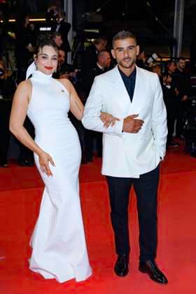 Internationale Filmfestspiele von Cannes, Kuang Ye Shi Dai - Resurrection Premiere Cannes Resurrection Red Carpet NG Sofiane Zermani and Short Films Jury Member Camélia Jordana attending the ‘‘Resurrection (Résurrection)’ Screening and Red Carpet at Palais Des Festivals in Cannes, France on May 23 2025 as part of the 78th Cannes Film Festival. Photo by Nicolas Genin ABACAPRESS.COM Cannes France  Copyright: xGeninxNicolas ABACAx