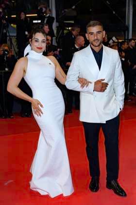 Internationale Filmfestspiele von Cannes, Kuang Ye Shi Dai - Resurrection Premiere Cannes Resurrection Red Carpet NG Sofiane Zermani and Short Films Jury Member Camélia Jordana attending the ‘‘Resurrection (Résurrection)’ Screening and Red Carpet at Palais Des Festivals in Cannes, France on May 23 2025 as part of the 78th Cannes Film Festival. Photo by Nicolas Genin ABACAPRESS.COM Cannes France  Copyright: xGeninxNicolas ABACAx
