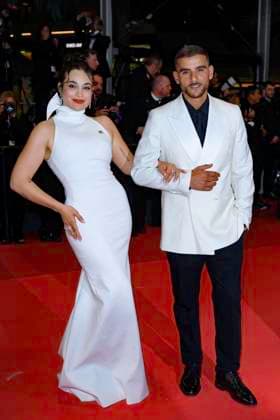 Internationale Filmfestspiele von Cannes, Kuang Ye Shi Dai - Resurrection Premiere Cannes Resurrection Red Carpet NG Sofiane Zermani and Short Films Jury Member Camélia Jordana attending the ‘‘Resurrection (Résurrection)’ Screening and Red Carpet at Palais Des Festivals in Cannes, France on May 23 2025 as part of the 78th Cannes Film Festival. Photo by Nicolas Genin ABACAPRESS.COM Cannes France  Copyright: xGeninxNicolas ABACAx