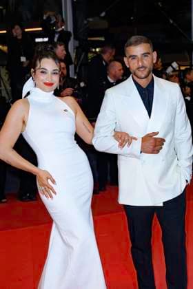 Internationale Filmfestspiele von Cannes, Kuang Ye Shi Dai - Resurrection Premiere Cannes Resurrection Red Carpet NG Sofiane Zermani and Short Films Jury Member Camélia Jordana attending the ‘‘Resurrection (Résurrection)’ Screening and Red Carpet at Palais Des Festivals in Cannes, France on May 23 2025 as part of the 78th Cannes Film Festival. Photo by Nicolas Genin ABACAPRESS.COM Cannes France  Copyright: xGeninxNicolas ABACAx