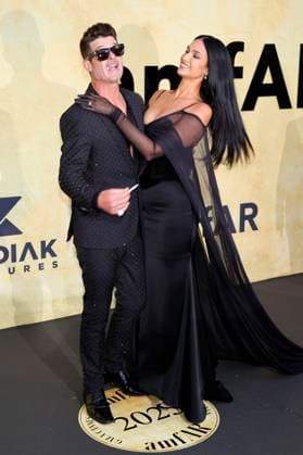 Robin Thicke with partner April Love Geary at the 31 amfAR Gala Cannes as part of the Festival de Cannes 2025 78 Cannes International Film Festival at the Hôtel du Cap Eden Roc Antibes, 22 05 2025 Foto:xD.xBedrosianx xFuturexImagex amfar_5720