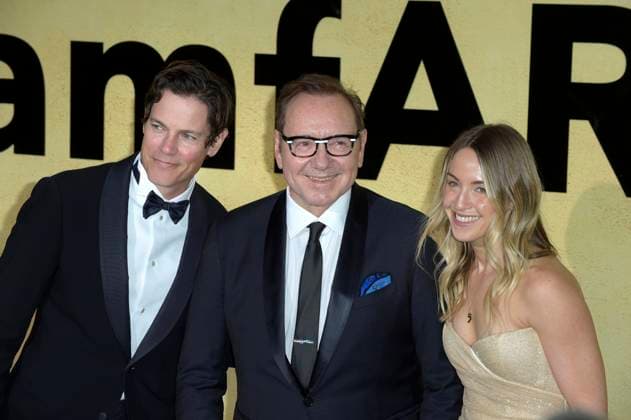 Kevin Spacey, Jaron Lowenstein and a guest attend the amfAR Gala Cannes 2025 presented by Chopard at Hotel du Cap-Eden-Roc on Thursday, May 22, 2025 in Cap d Antibes, France.  CAN20250522201 RoccoxSpaziani
