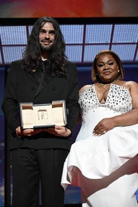 Cannes - Closing Ceremony French-Spanish film director Oliver Laxe and Da Vine Joy Randolph on stage after he won the Jury Prize for the film Sirat during the closing ceremony at the 78th edition of the Cannes Film Festival in Cannes, France, on May 24, 2025. Photo by David Niviere ABACAPRESS.COM Cannes France  Copyright: xNivierexDavid ABACAPRESS.COMx
