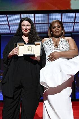 Cannes - Closing Ceremony Mascha Schilinski (L) accepts the Jury Prize (TIE) for Sound of Falling from Da Vine Joy Randolph (R) onstage during the closing ceremony at the 78th annual Cannes Film Festival at Palais des Festivals on May 24, 2025 in Cannes, France, on May 24, 2025. Photo by David Niviere ABACAPRESS.COM Cannes France  Copyright: xNivierexDavid ABACAPRESS.COMx
