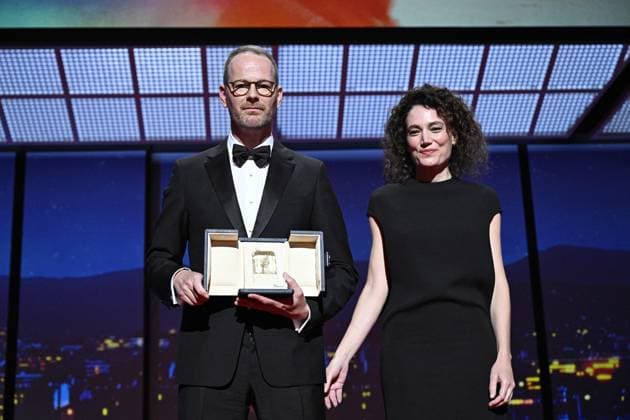 Cannes - Closing Ceremony Norwegian director and screenwriter Joachim Trier receives from French director Coralie Fargeat the Grand Prix for the film Affeksjonsverdi (Sentimental Value) during the closing ceremony at the 78th edition of the Cannes Film Festival in Cannes, France, on May 24, 2025. Photo by David Niviere ABACAPRESS.COM Cannes France  Copyright: xNivierexDavid ABACAPRESS.COMx