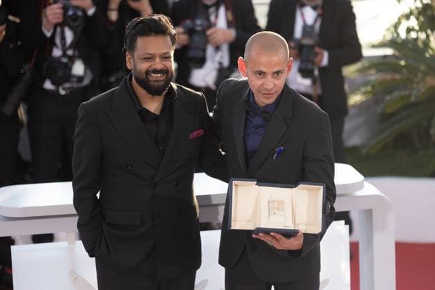 78. Internationalen Filmfestspiele von Cannes 2025 - Awards Cannes, Frankreich - 24.5.2024: Adnan Al Rajeev und Tawfeek Barhom, Gewinner des Kurzfilm-Preises für den Film - I m Glad You re Dead Now - während des Photocalls mit den Awards während der Abschlusszeremonie während der 78. Internationalen Filmfestspiele von Cannes. Die 78. Internationalen Filmfestspiele von Cannes finden vom 13. bis 24. Mai 2025 statt. Provence-Alpes-Cote d Azur