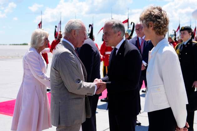 May 26, 2025, Ottawa, On, Canada: Prime Minister Mark Carney greets King Charles as he and Queen Camilla arrive at the Ottawa International Airport in Ottawa for a royal visit, on Monday, May 26, 2025. Ottawa Canada  - ZUMAc35_ 20250526_zaf_c35_059 Copyright: xJustinxTangx