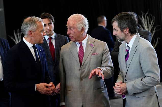 May 26, 2025, Ottawa, On, CAN: King Charles speaks with Prime Minister Mark Carney, left, as Minister of Canadian Identity and Culture Steven Guilbeault, right, listens, as they view a community gathering at Lansdowne Park in Ottawa during a royal visit, on Monday, May 26, 2025. Ottawa CAN - ZUMAc35_ 20250526_zaf_c35_093 Copyright: xJustinxTangx