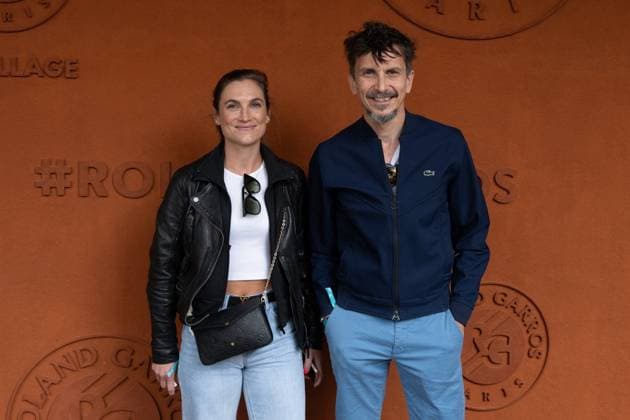 French Open - Vips At The Village - Day 3 A Guest and Arnaud Tsamere take a pose at Roland Garros for the French open on May 27, 2025, in Paris, France. Photo by Laurent Zabulon ABACAPRESS.COM Paris France  Copyright: xZabulonxLaurent ABACAx