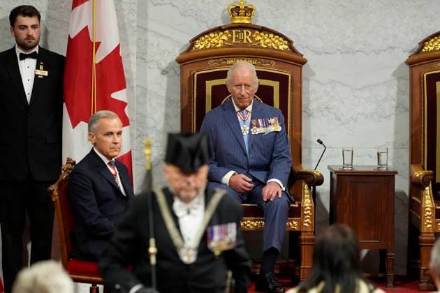 May 27, 2025, Ottawa, On, Canada: Prime Minister Mark Carney, left, and King Charles look on ahead of the King delivering the speech from the throne in the Senate in Ottawa on Tuesday, May 27, 2025. Ottawa Canada  - ZUMAc35_ 20250527_zaf_c35_022 Copyright: xAdrianxWyldx