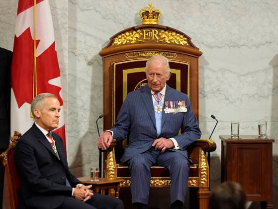 May 27, 2025, Ottawa, On, Canada: Prime Minister Mark Carney, left, and King Charles look on ahead of the King delivering the speech from the throne in the Senate in Ottawa on Tuesday, May 27, 2025. Ottawa Canada  - ZUMAc35_ 20250527_zaf_c35_023 Copyright: xAdrianxWyldx