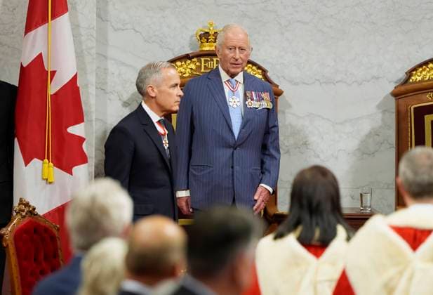 May 27, 2025, Ottawa, On, Canada: Prime Minister Mark Carney, left, and King Charles look on ahead of the King delivering the speech from the throne in the Senate in Ottawa on Tuesday, May 27, 2025. Ottawa Canada  - ZUMAc35_ 20250527_zaf_c35_033 Copyright: xAdrianxWyldx