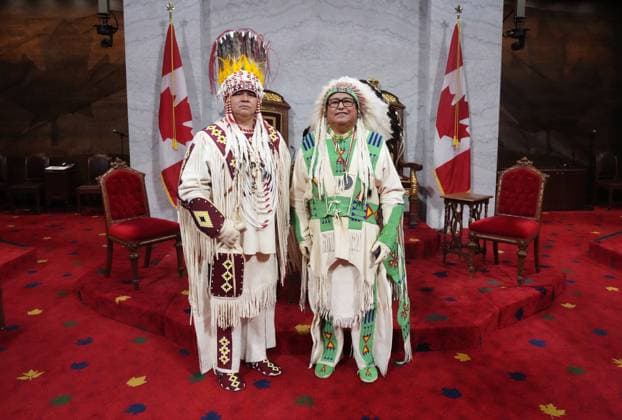 May 27, 2025, Ottawa, On, Canada: Siksika Nation Chief Ouray Crowfoot, left, and and Elder Leonard Weasel Traveller pose ahead of King Charles delivering the speech from the throne in the Senate in Ottawa on Tuesday, May 27, 2025. Ottawa Canada  - ZUMAc35_ 20250527_zaf_c35_008 Copyright: xChrisxYoungx
