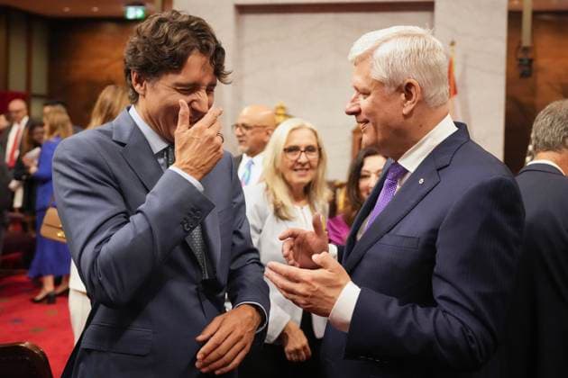 May 27, 2025, Ottawa, On, Canada: Former prime ministers Justin Trudeau, left, and Stephen Harper share a laugh ahead of King Charles delivering the speech from the throne in the Senate in Ottawa on Tuesday, May 27, 2025. Ottawa Canada  - ZUMAc35_ 20250527_zaf_c35_090 Copyright: xChrisxYoungx