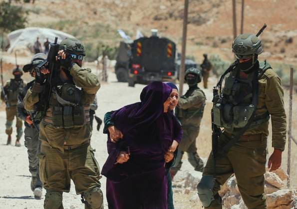 News Themen der Woche KW22 Bilder des Jahres 2025, News 05 Mai News Bilder des Tages Demolishing Home and Barn in Hebron A Palestinian woman pulls another woman away as Israeli occupation soldiers advance during a raid in the Al-Jawaya area of Yatta, south of Hebron, West Bank on May 28, 2025. A house, home to a family of eight, was demolished along with a sheep barn by occupation forces. Herbon West Bank Palestinian Territories Copyright: xMosabxShawerx
