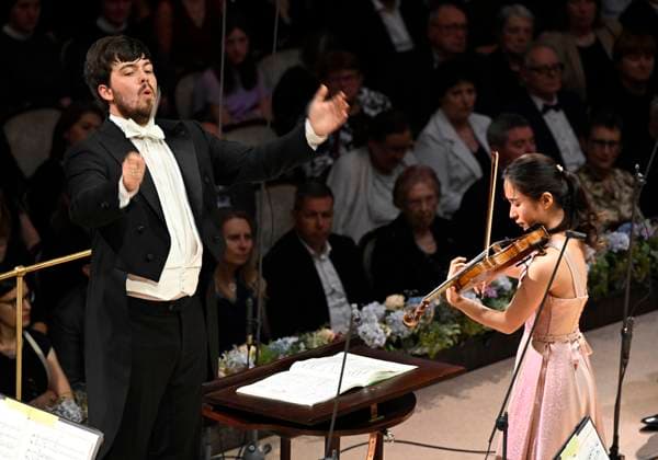 Japanese violinist Tsukushi Sasaki, right, performs at the Prague Radio Symphony Orchestra concert under Czech conductor Jan Sedlacek, left, during the Prague Spring International Music Festival on 28 May 2025, Prague, Czech Republic. (CTKxPhoto KaterinaxSulova) CTKPhotoP2025052809806  CTKPhotoP2025052809806