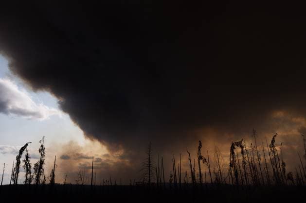 May 30, 2025, Buckinghorse River, Bc, Canada: Wildfire smoke is seen on Highway 97 north of Buckinghorse River, B.C. on Friday, May 30, 2025. Buckinghorse River Canada  - ZUMAc35_ 20250530_zaf_c35_191 Copyright: xNasunaxStuart-Ulinx