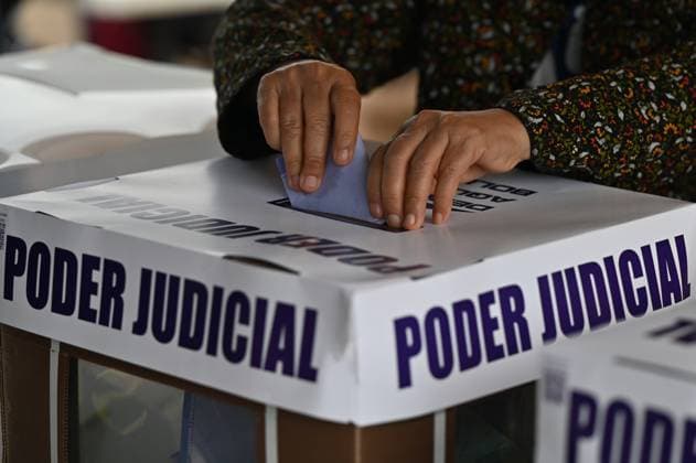 June 1, 2025, Tijuana, Baja California, Mexico: A voter casts her ballots at a Ã¢â‚¬oespecial ballot box zone installed for people living outside the border city of Tijuana, Mexico is seen at a polling station at the Tijuana Cultural Center during the world-first Mexican elections to elect all judges and magistrates on Sunday, June 1, 2025. Polls opened Sunday in elections making Mexico the world s only country to select its judges at all levels by popular vote. Tijuana Mexico - ZUMAm180 20250601_zip_m180_008 Copyright: xCarlosxA.xMorenox