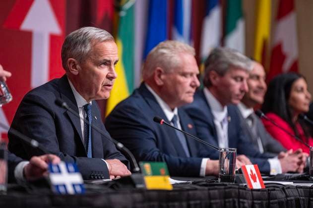 June 2, 2025, Saskatoon, Sk, CANADA: Prime Minister Mark Carney, left, speaks to media following the First MinisteröÄÃ s Meeting in Saskatoon, Sask., Monday, June 2, 2025. Saskatoon CANADA - ZUMAc35_ 20250602_zaf_c35_207 Copyright: xLiamxRichardsx